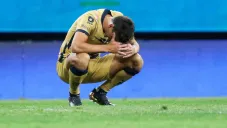 Juan Dinenno se lamenta tras una falla ante Chivas