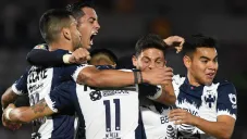 Jugadores de Rayados festejan un gol