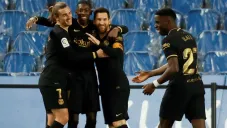 Jugadores del Barça festejan una anotación