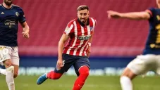 Héctor Herrera durante un partido con Atlético de Madrid