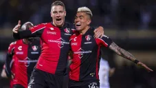 Julio Furch y Hueso Reyes en festejo