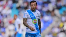 Christian Tabó jugando partido con Puebla en la Liga MX