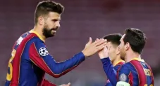 Piqué y Messi en un partido