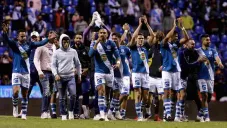 Puebla celebrando el triunfo ante Rayados