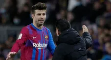 Gerard Piqué y Xavi Hernández