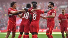 Jugadores del Liverpool festejando anotación ante el Manchester City