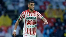 Fabricio Formiliano jugando partido con Necaxa en la Liga MX