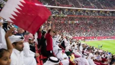 Afición qatarí disfrutando de un partido