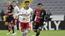 Aldo Rocha y Fernando Beltrán durante el Clásico Tapatío