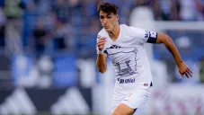 Dinenno en un partido de Pumas