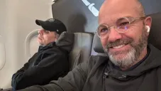 Martinoli y García en el avión