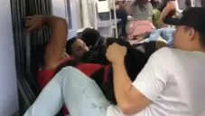 Los aficionados que estuvieron en medio del tiroteo en la estación de trenes