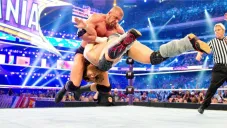 Hunter haciendo un pedigree en WestleMania