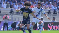 Maxi Meza luchando con el Chino Huerta