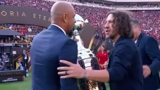 Puyol con Felipe Melo y Julio César