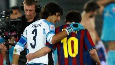 Vilar conversando con Lionel Messi