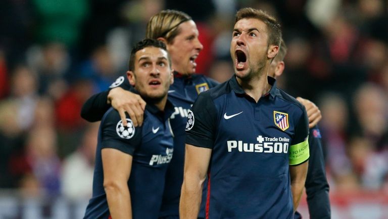 Jugadores del Atlético celebran el gol de Griezmann