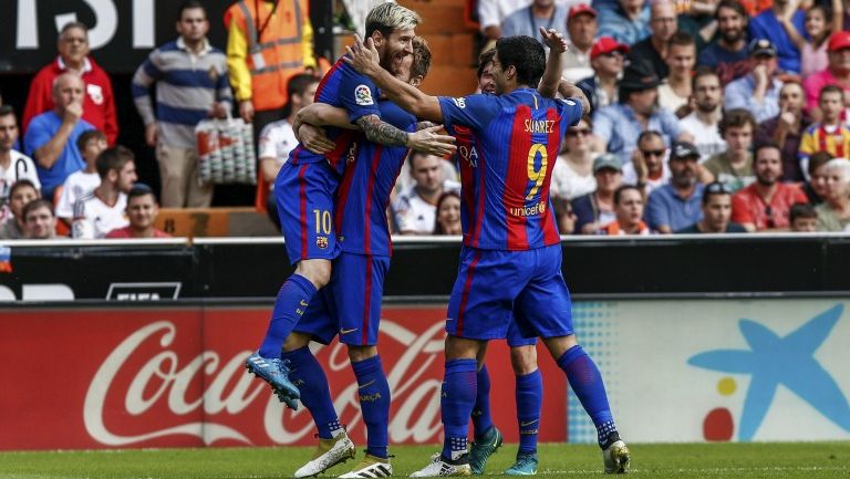 Messi y compañía celebran un tanto de La Pulga contra Valencia