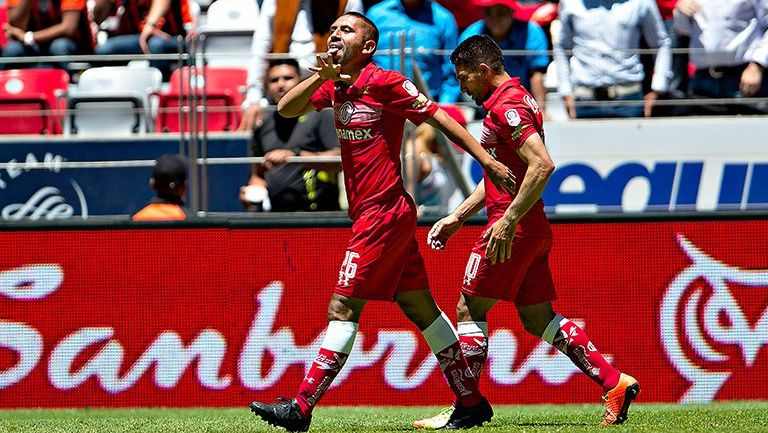 Erbin Trejo celebra un gol contra el Necaxa