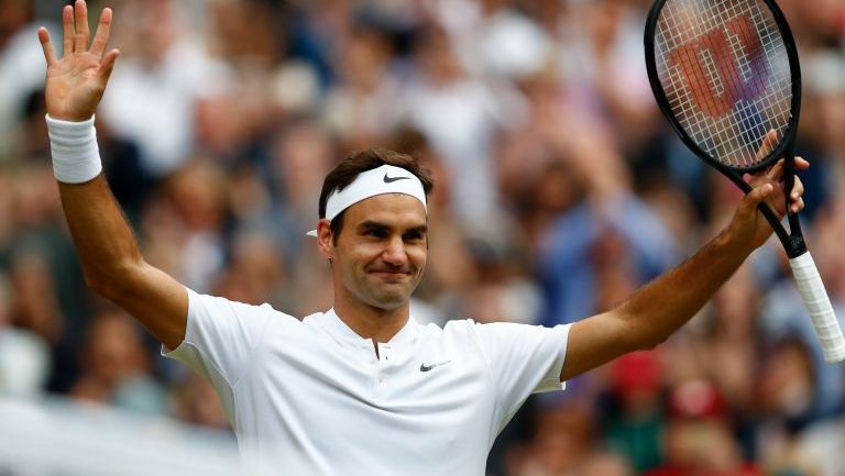 Federer celebra su victoria frente a Berdych en Wimbledon