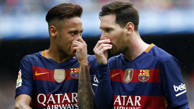 Messi y Neymar, durante un juego con el Barcelona