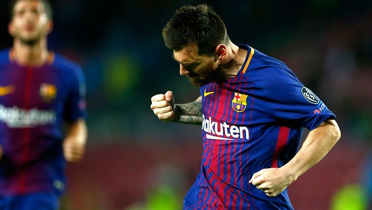 Messi celebra su anotación contra Olimpiacos