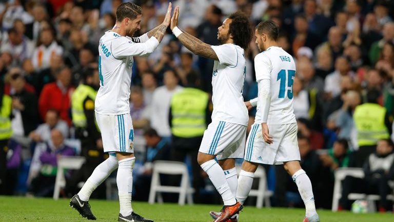 Marcelo y Ramos celebran el último gol del Madrid