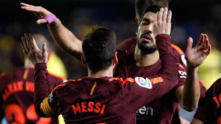 Messi y Suárez celebran un gol en un partido