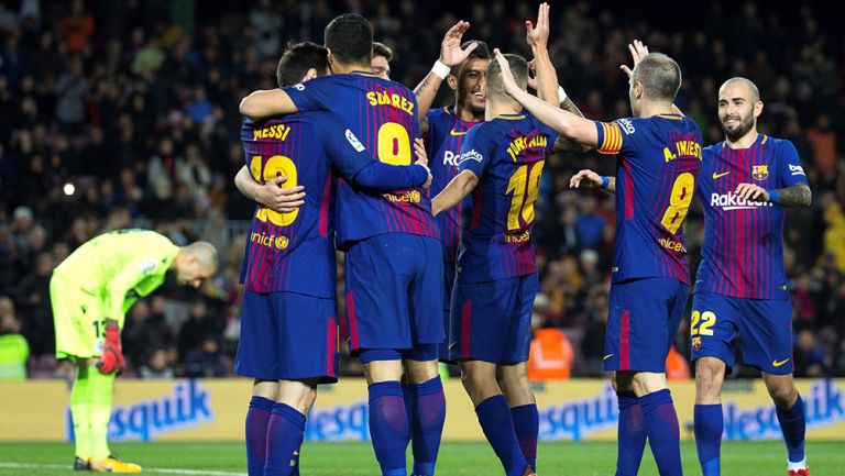 Jugadores del Barcelona festejan un gol contra el Deportivo