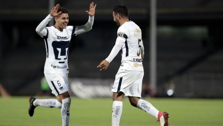Mendoza celebra gol sobre Lobos BUAP
