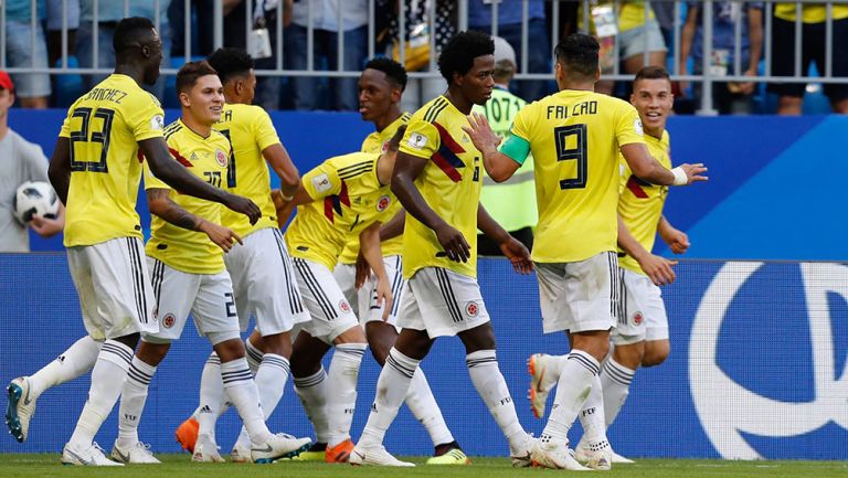Jugadores de Colombia celebran gol contra Senegal