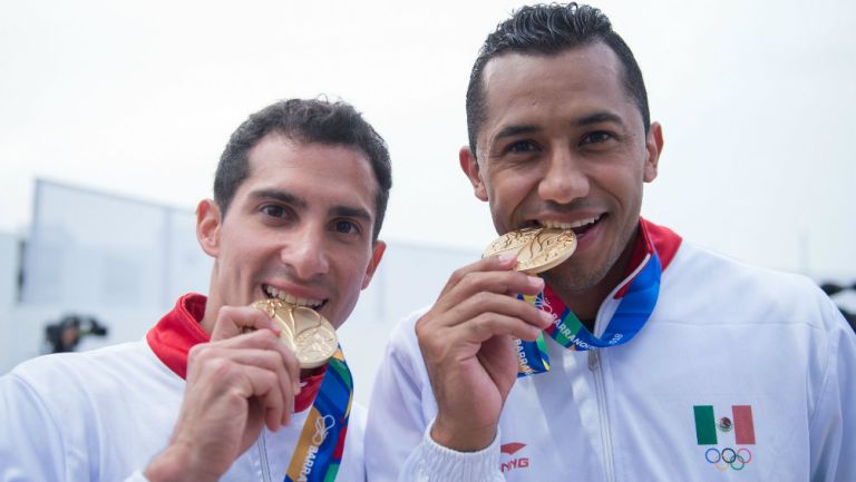 Rommel Pacheco y Jahir Ocampo tras conquistar el oro