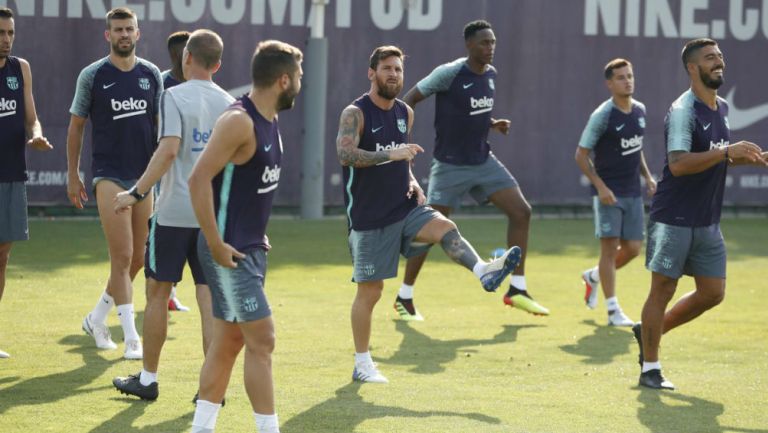Jugadores del Barcelona durante el entrenamiento