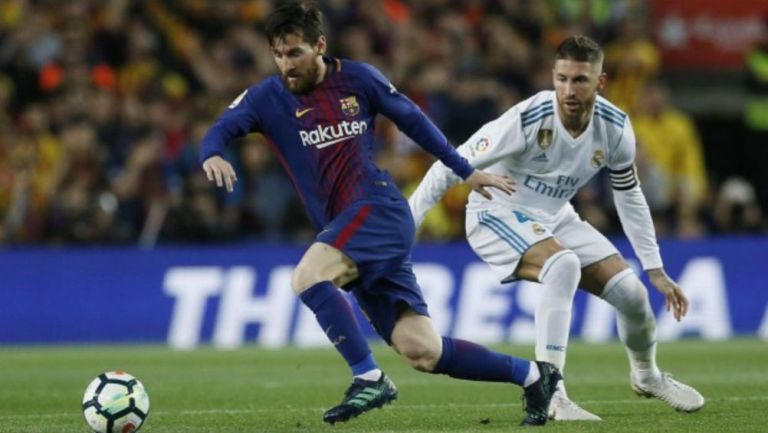 Messi y Ramos durante el Clásico Español