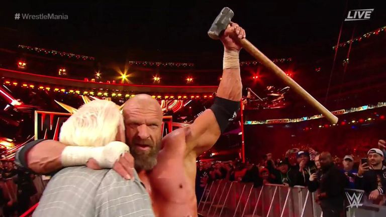 Triple H fesetja el triunfo con Ric Flair