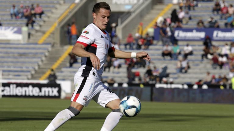 Abraham González durante un juego de Lobos BUAP