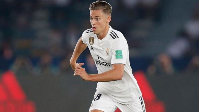 Marcos Llorente disputa un duelo con el Real Madrid 