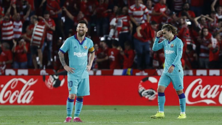 Lionel Messi y Antoine Griezmann lamentan la derrota