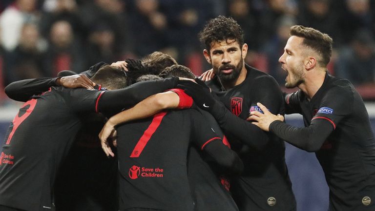Jugadores del Altético de Madrid celebran gol contra Lokomotiv 