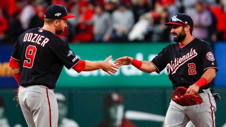  Brian Dozier y Adam Eaton festejan su victoria con Washington