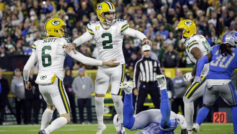 Mason Crosby celebra el gol de campo de la victoria