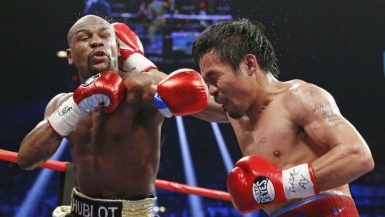 Mayweather Jr. y Pacquiao intercambian golpes