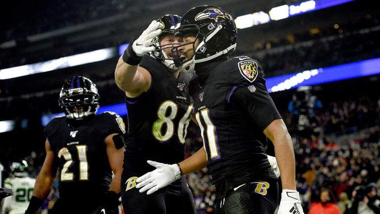 Seth Roberts celebra su touchdown contra Jets