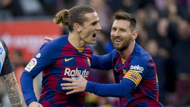 Griezmann y Messi celebran un gol con Barcelona 