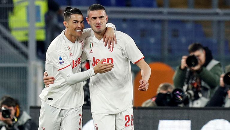 Cristiano Ronaldo celebra un gol con Merih Demiral