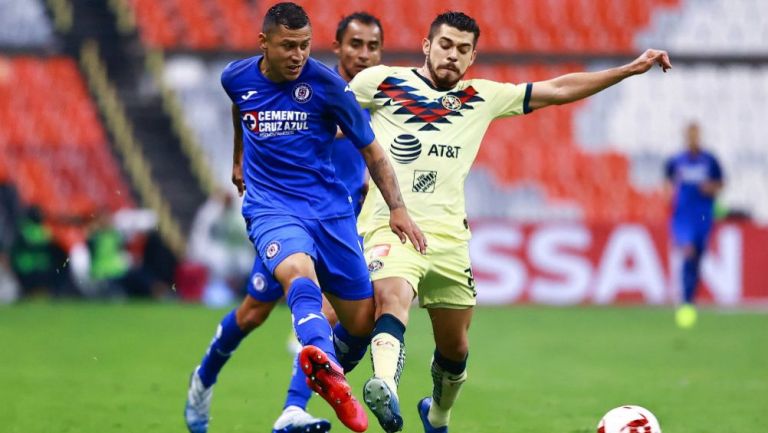 Julio Cesar Dominguez y Henry Martin, durante el partido