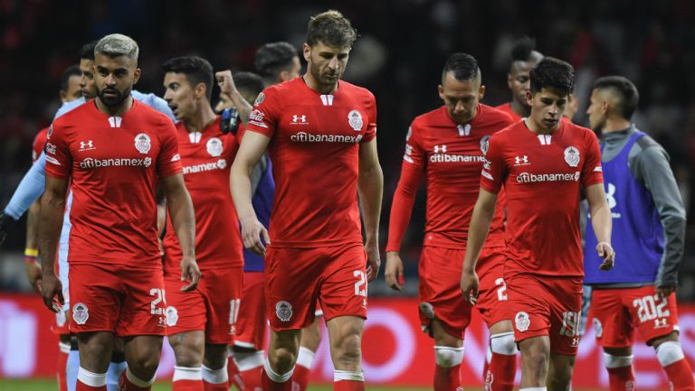 Jugadores de Toluca en partido de la Liga MX