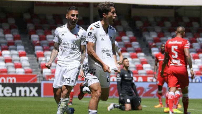 Javier Abella celebra su gol ante Toluca 