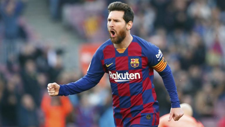 Leo Messi festeja un gol con el Barcelona