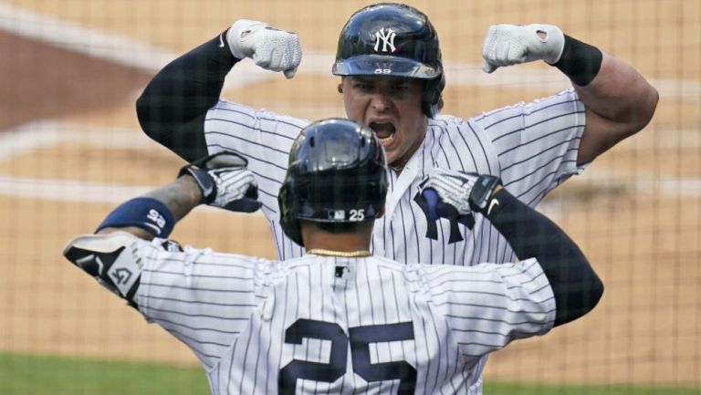 Luke Voit y Gleyber Torres en festejo